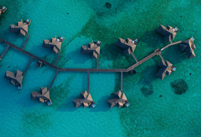 Sitting on Boat Spreading Her Arms